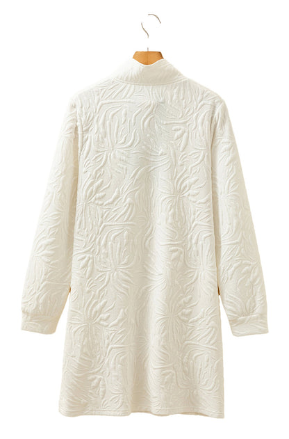 LuckeLadybug white jacquard mini dress back view long sleeve collared textured fabric on wooden hanger