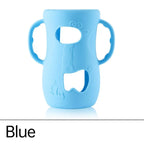 Blue silicone cover for baby bottle warmer with easy-grip handles and playful design