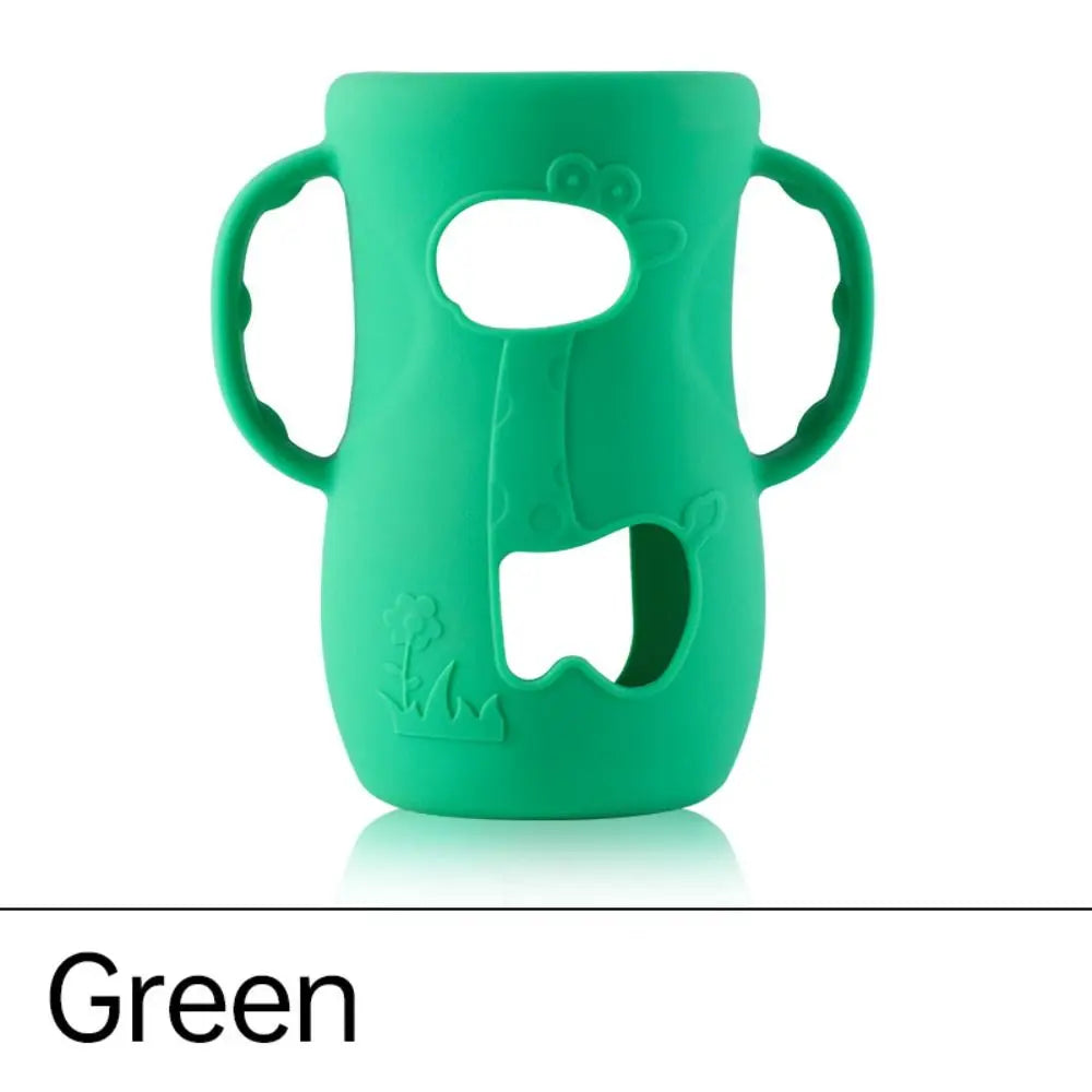 Green silicone cover for baby bottle warmer with easy grip handles and playful design