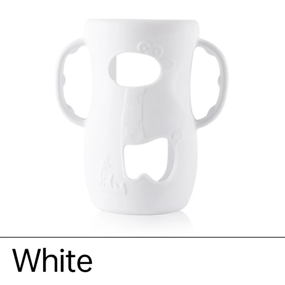 White baby bottle warmer with playful design and easy-grip handles for parents