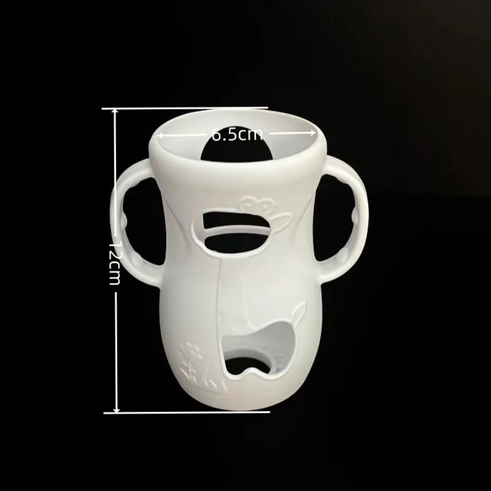 LuckeLadybug baby bottle warmer made from white ceramic with ergonomic handles and cut-out design