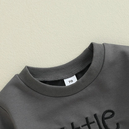 Gray baby boy Halloween romper featuring soft fabric and playful design for festive celebrations