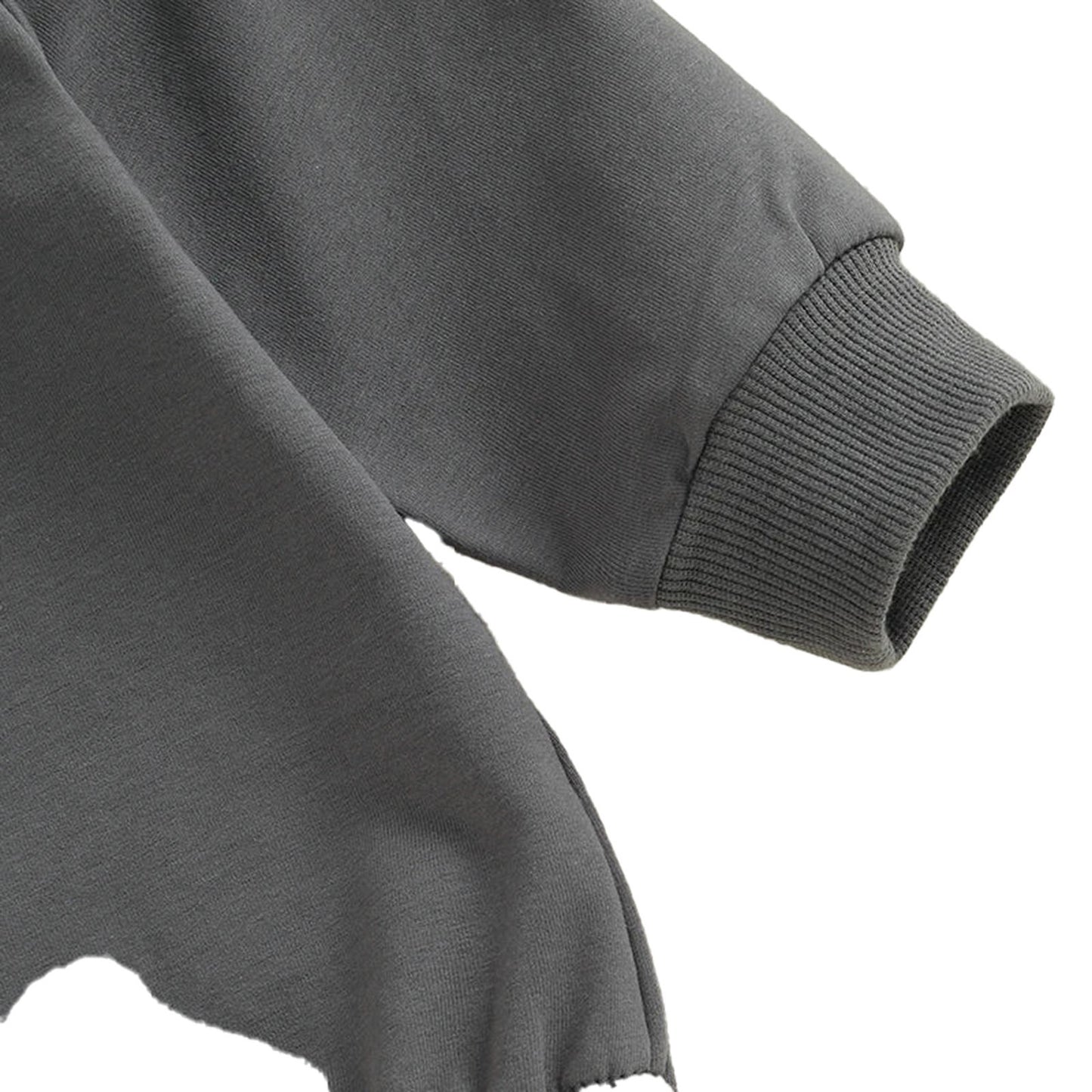 Soft gray fabric of a baby boy Halloween romper with snug cuffs for comfort and style