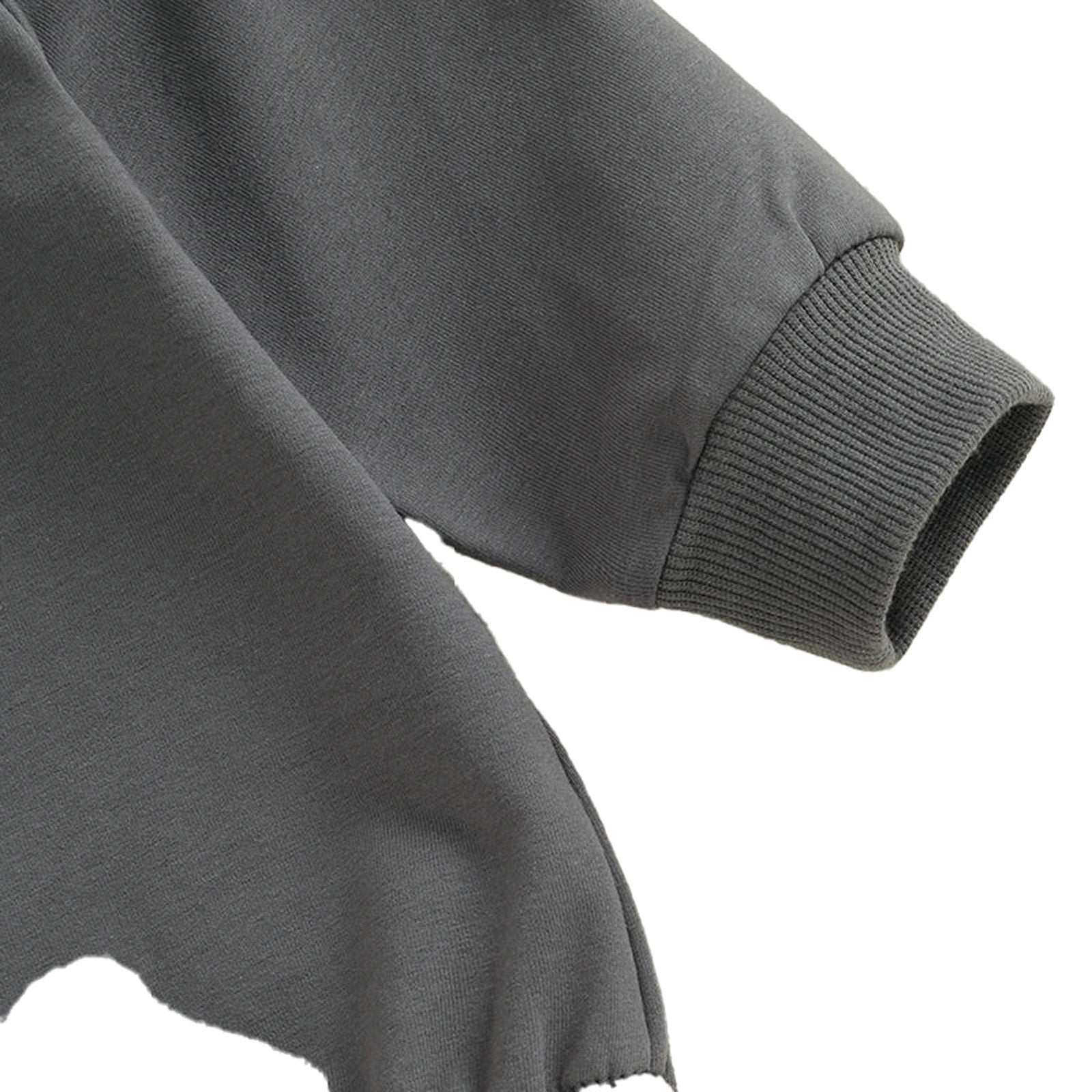 Soft gray fabric of a baby boy Halloween romper with snug cuffs for comfort and style