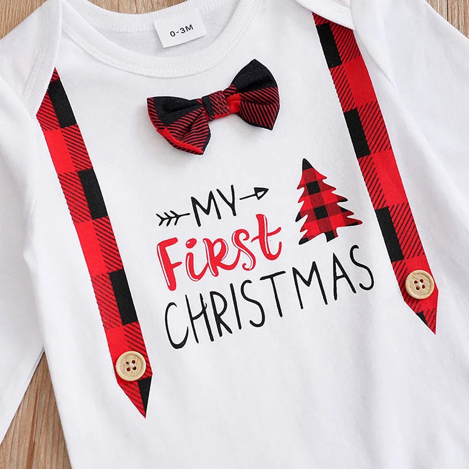 Baby Christmas outfit set featuring a My First Christmas design with suspenders and a bow tie
