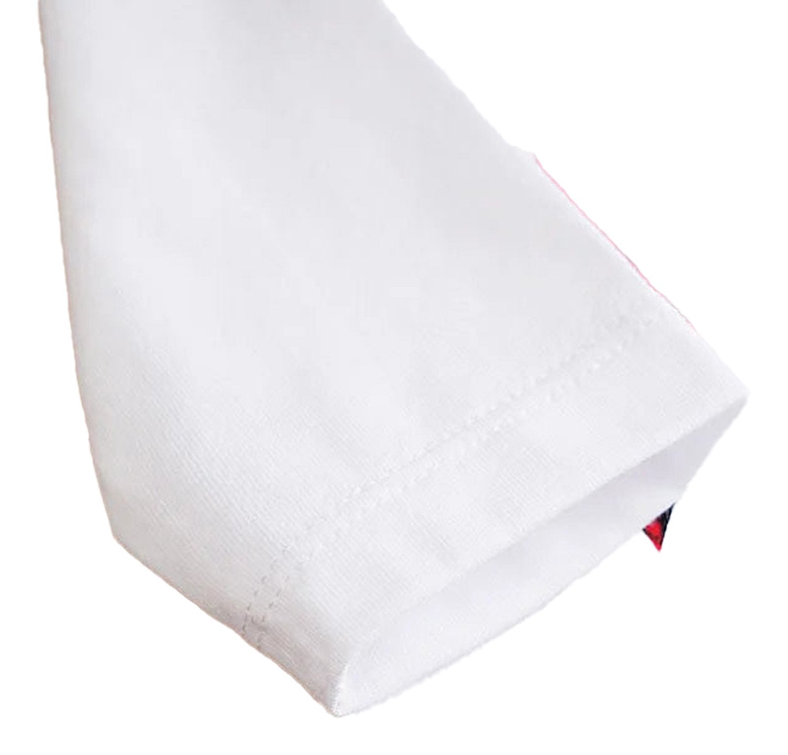 Close-up of a white sleeve from a baby Christmas outfit set featuring festive design elements