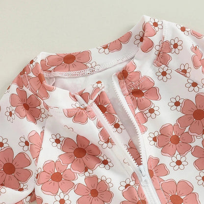 LuckeLadybug baby girl flower print swimsuit with vibrant floral design in soft colors