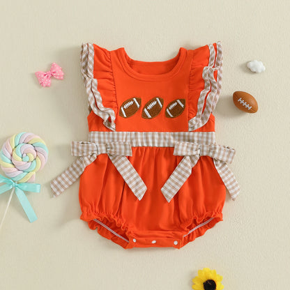 Bright orange baby girl rugby romper with football designs and plaid accents for playful outfits