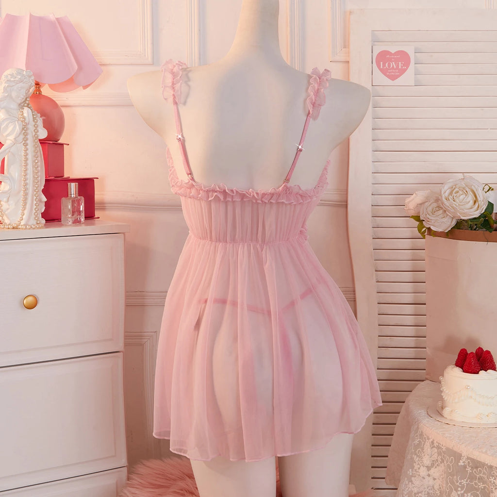 Pink babydoll dress with delicate straps and sheer fabric for a romantic look