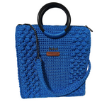 Blue crocheted tote bag for crochet with stylish handles and versatile design