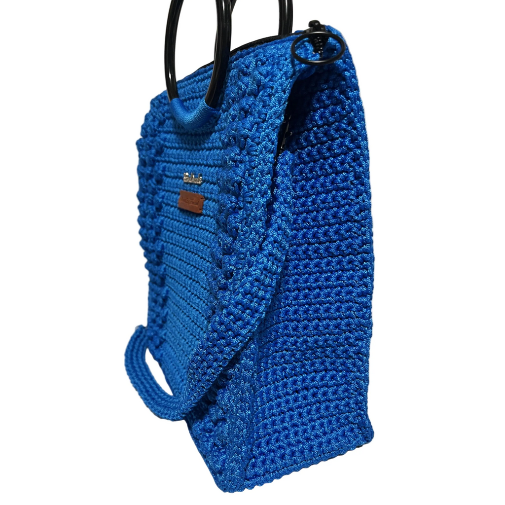 Blue crocheted tote bag for crochet with sturdy handles and ample space for projects