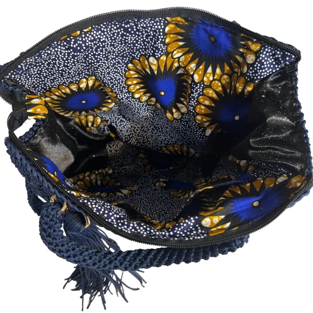 Stylish ThreadsByHannah tote bag with sling featuring vibrant floral patterns and braided handle