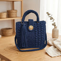 Stylish navy blue tote bag with sling and tassel detail for everyday use