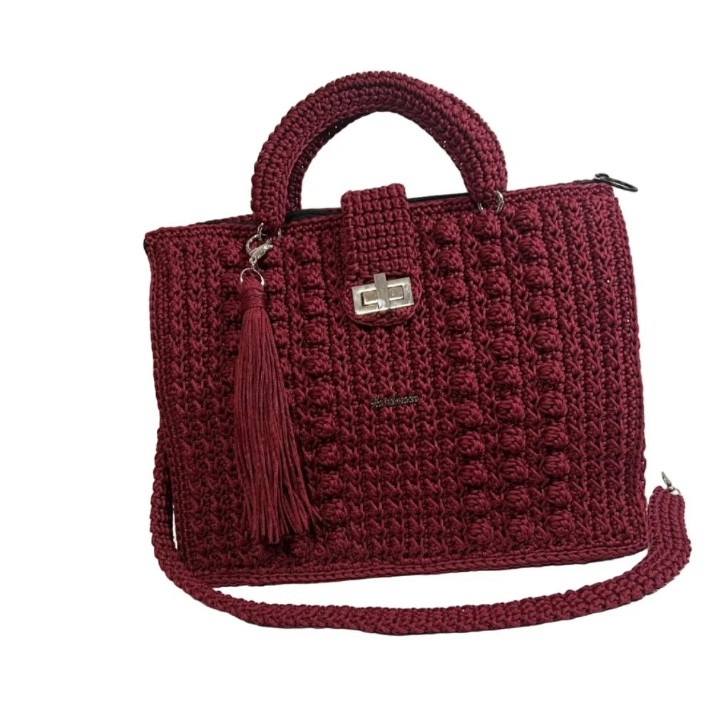 Burgundy ThreadsByHannah tote bag with sling featuring a textured design and a stylish tassel