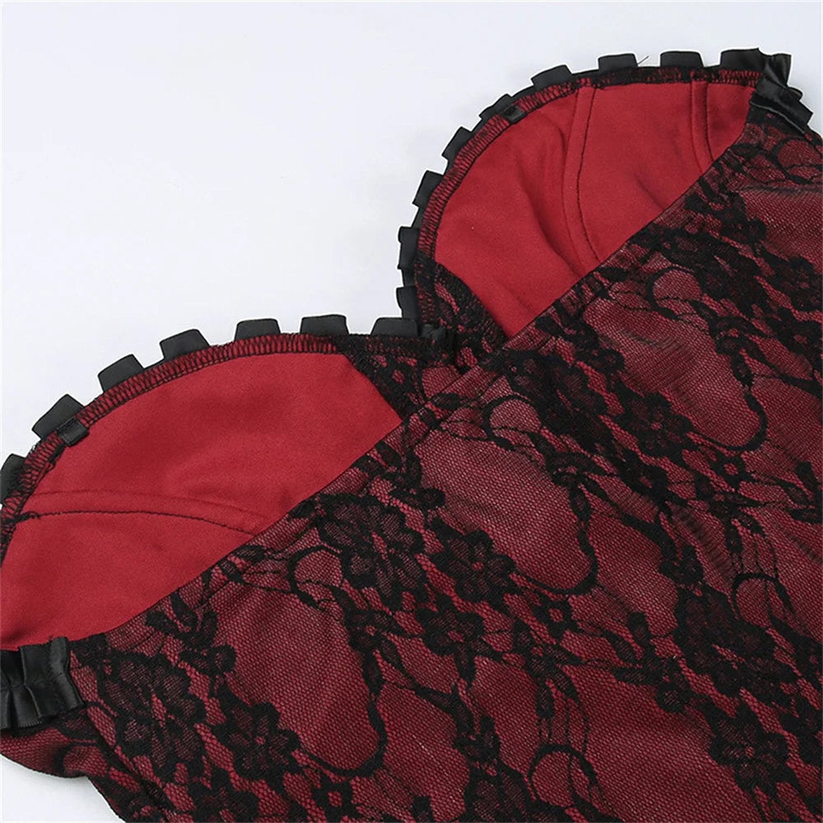 Gothic lace corset crop top in red and black with intricate lace detailing and ruffle trim