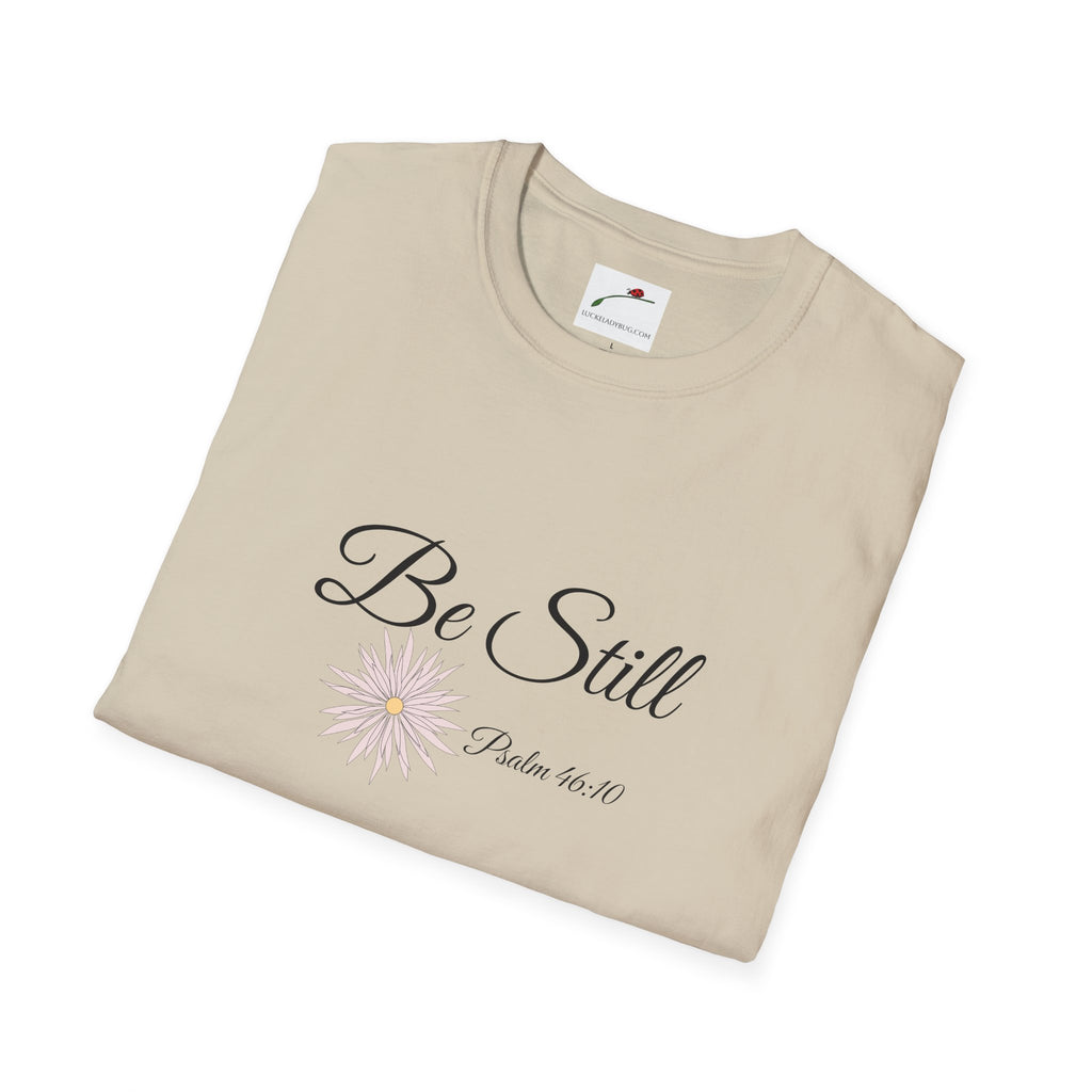 Be still bible verse t shirt beige with cursive text and floral design from LuckeLadybug