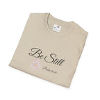 Be still bible verse t shirt beige with cursive text and floral design from LuckeLadybug