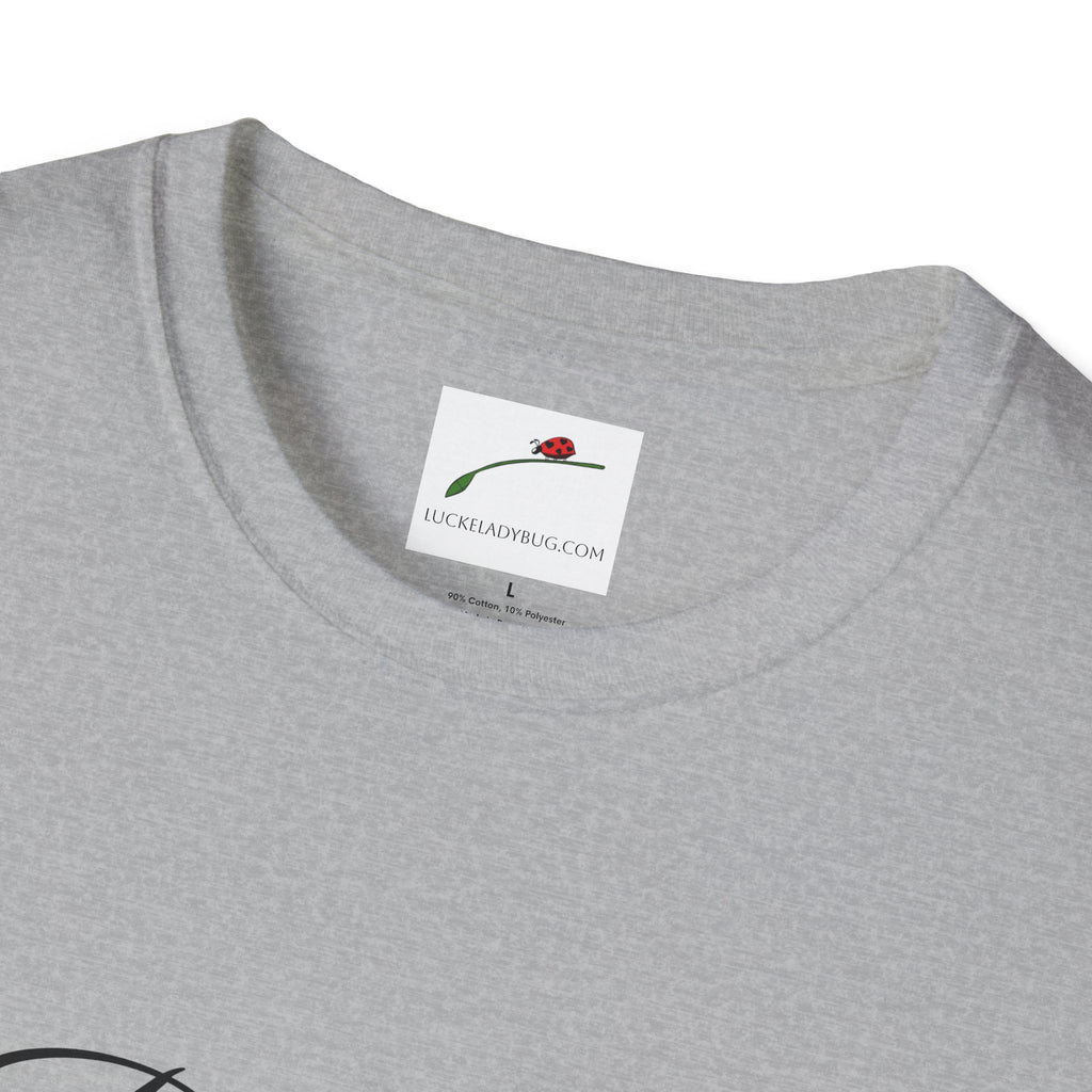 Light gray T-shirt from LuckeLadybug with be still bible verse t shirt design tag inside collar