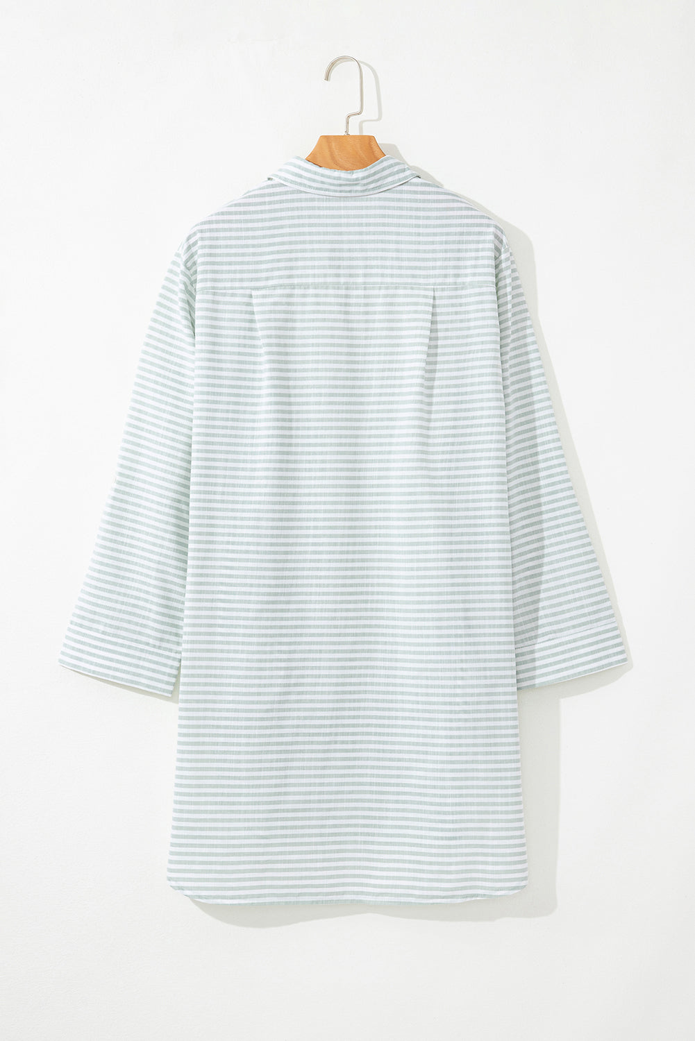 Light striped cover up for the beach with long sleeves and relaxed fit for casual comfort