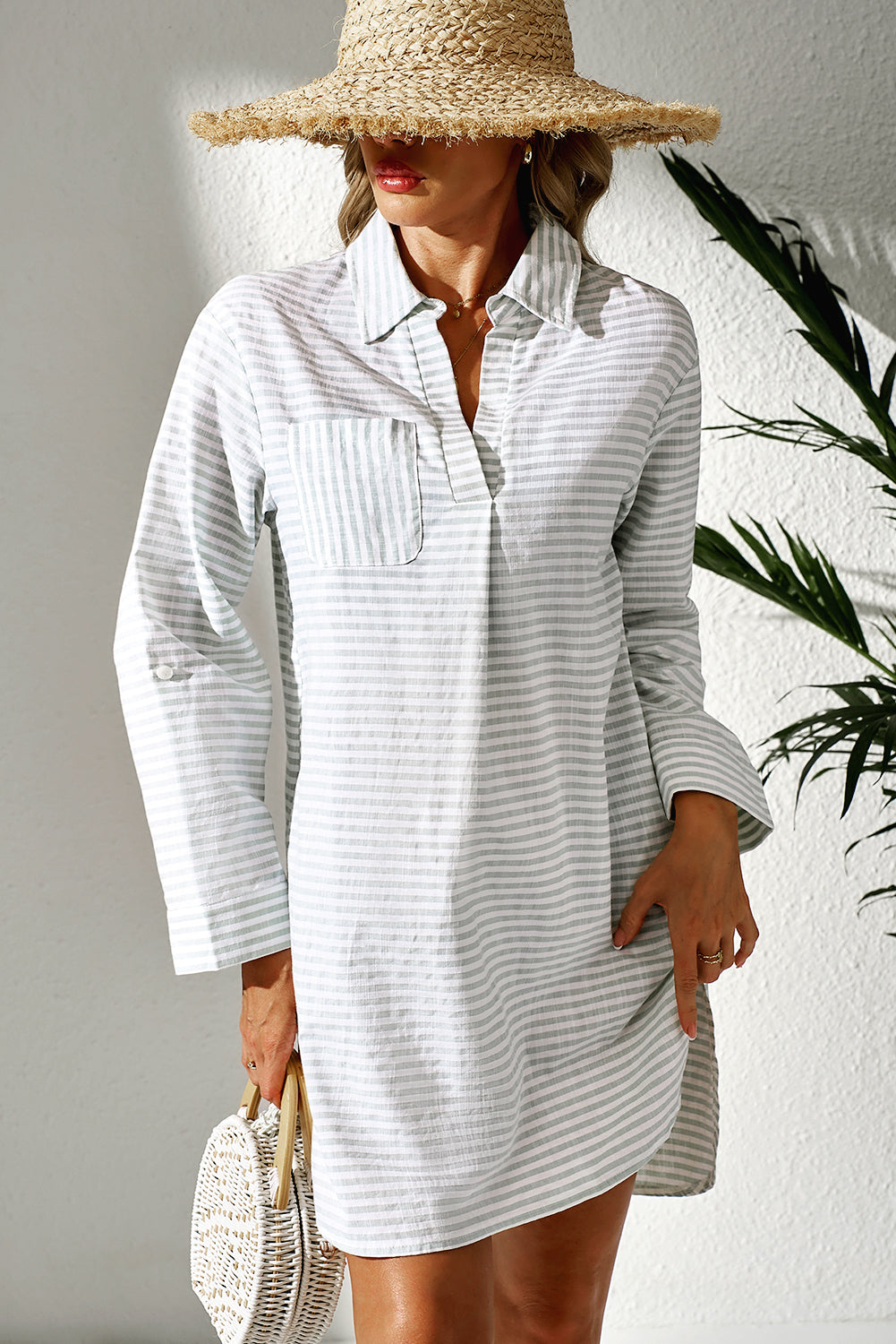 Lightweight striped cover up for the beach with a collared design and long sleeves