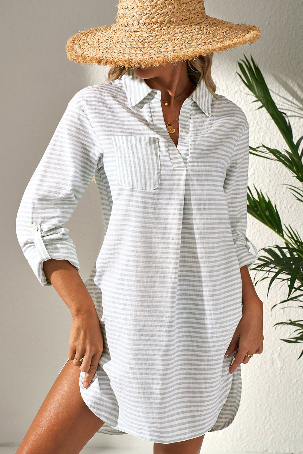 Lightweight striped cover up for the beach with a collar and rolled sleeves for warm weather