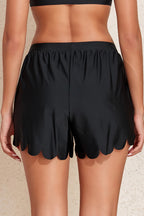 Black scalloped beach shorts men designed for comfort and style at the beach