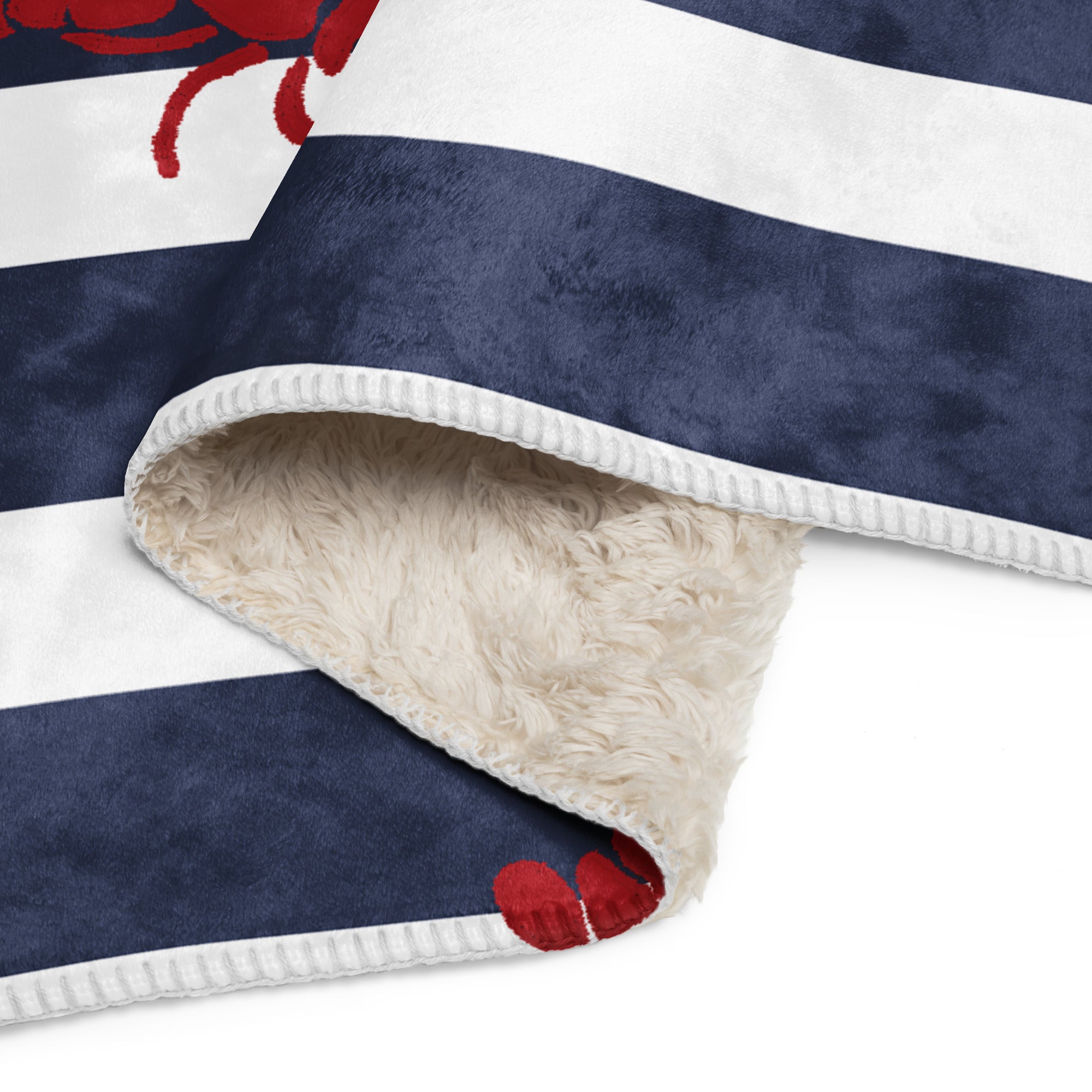 LuckeLAdybug beach theme sherpa blanket with navy and white stripes and soft cream sherpa lining