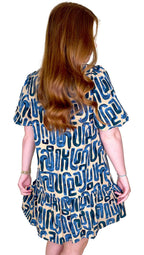 Beige abstract print mini dress from LuckeLadybug with a playful design and flowy fit