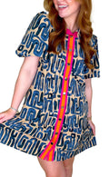 LuckeLadybug beige abstract print mini dress with a colorful button front and short sleeves