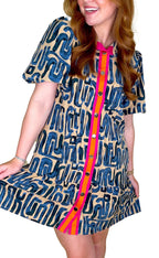 LuckeLadybug beige abstract print mini dress with a colorful button front and short sleeves