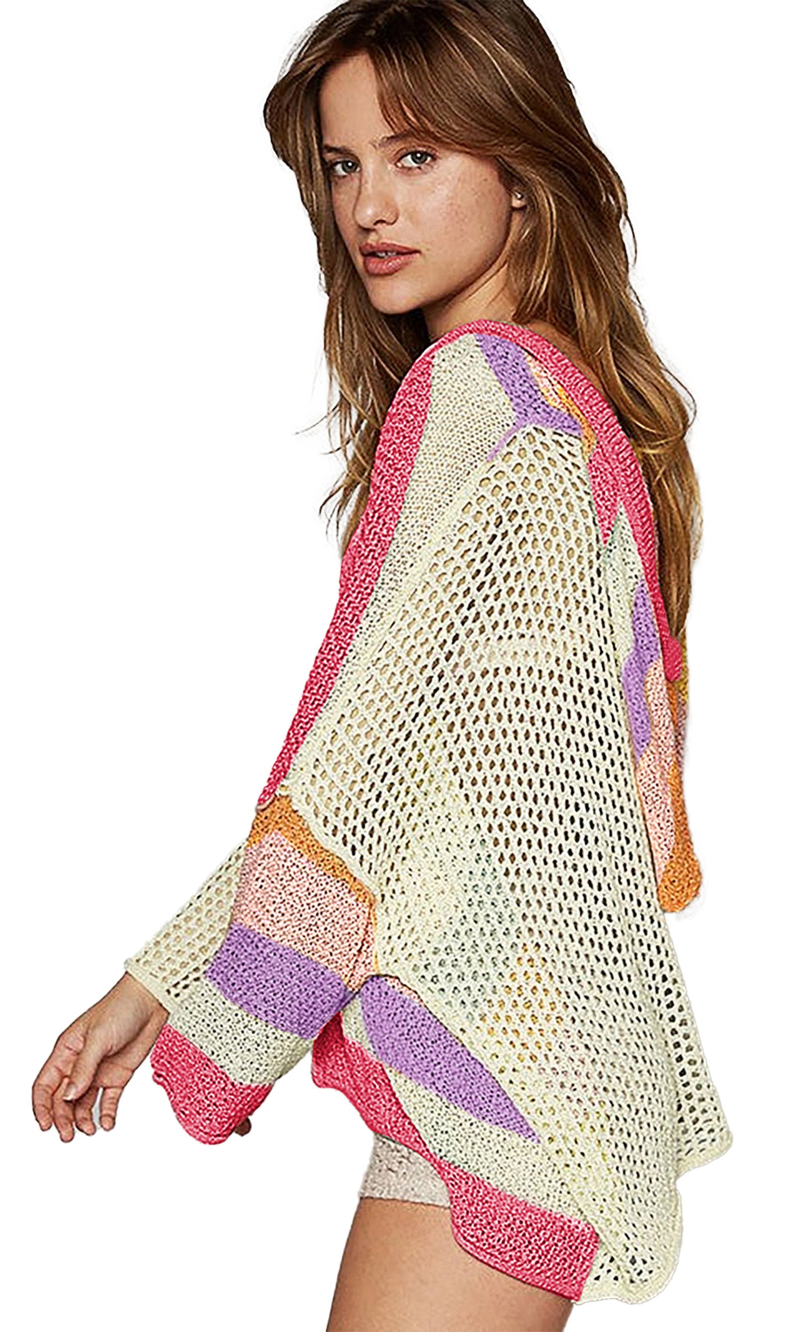 Beige oversized colorblock sweater with vibrant stripes and a loose fit for a trendy look