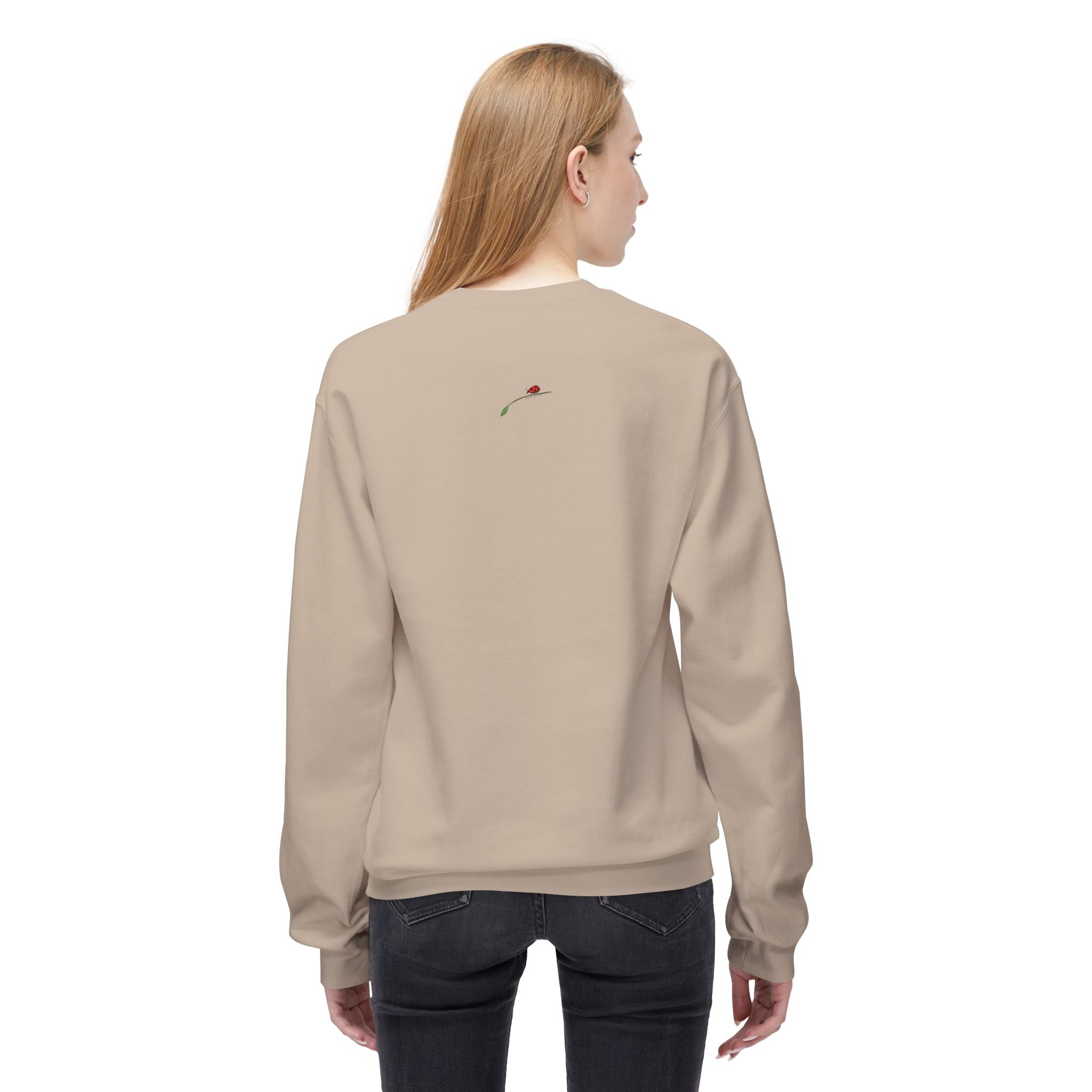LuckeLadybug beige Yorkie dog lover sweatshirt with small rose design on back worn by woman