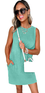 LuckeLadybug Phalaenopsis tank mini dress with pockets. Mint green sleeveless mini dress styled with white handbag and sunglasses