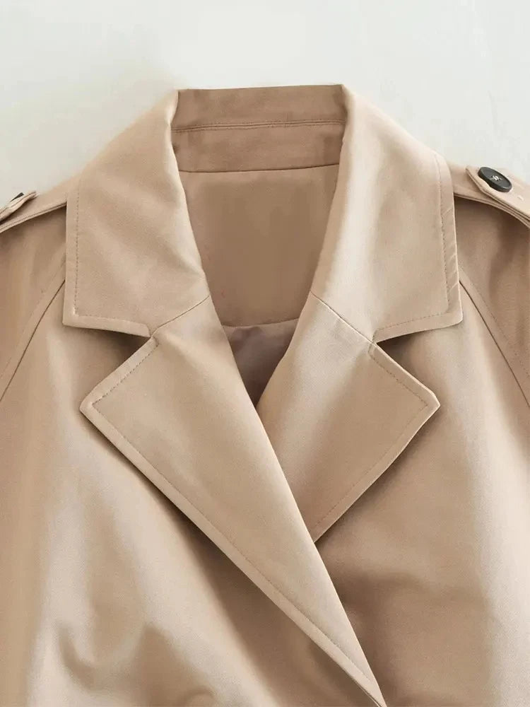 Belted cropped trench jacket women in beige with stylish collar and button details