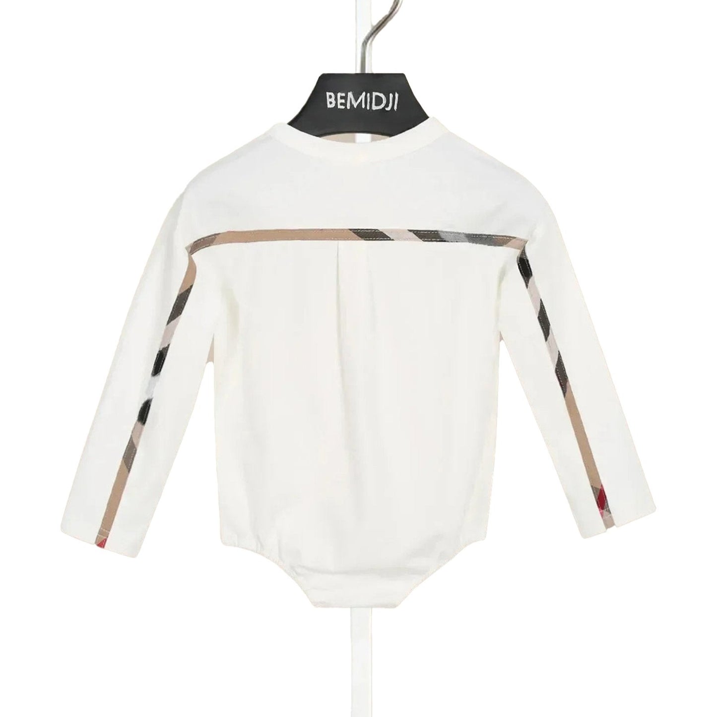 LuckeLadybug plaid romper baby clothes displayed on a hanger with matching shoes on the stand