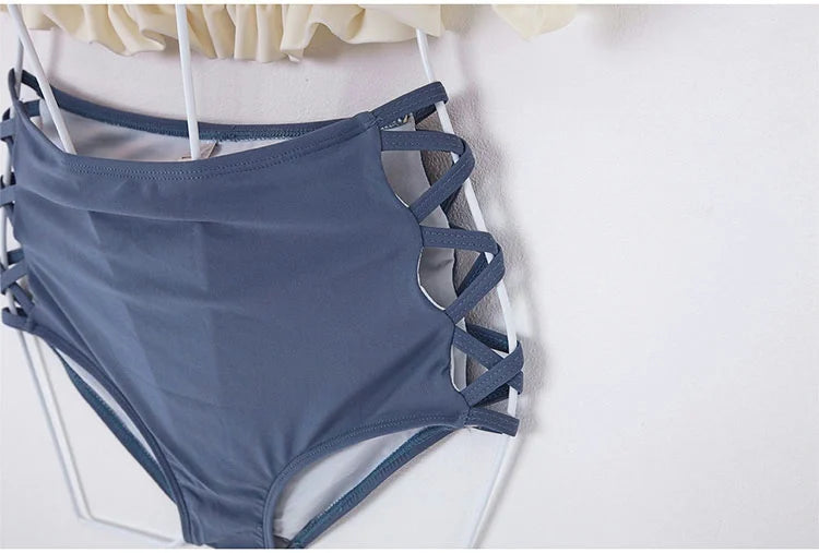 LuckeLadybug LLC beugel bikini set with unique crisscross design and high-waisted bottom in blue