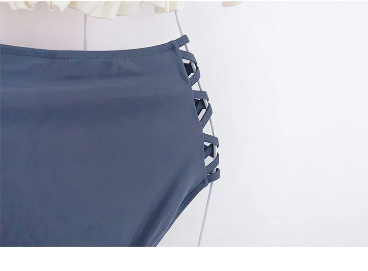 Gray beugel bikini set featuring stylish side crisscross detailing for a trendy summer look