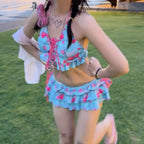 LuckeLadybug beugel bikini set in blue with ruffled details and cute pink patterns