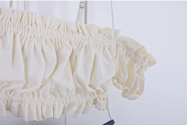 Cream-colored beugel bikini set with ruffled design for stylish beachwear