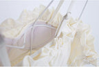 White beugel bikini set with ruffled edges and adjustable straps for a stylish beach look
