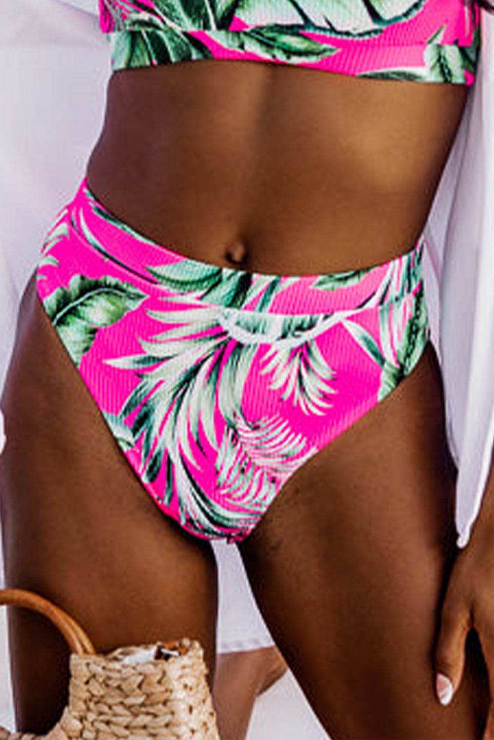 LuckeLadybug LLC high-waisted bikini bottoms in pink with tropical leaf print for stylish beachwear