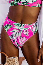 LuckeLadybug LLC high-waisted bikini bottoms in pink with tropical leaf print for stylish beachwear