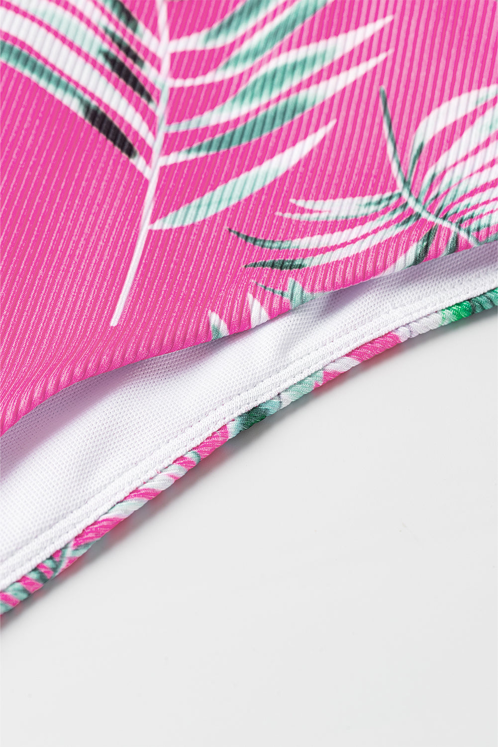 LuckeLadybug bikini bottoms in pink with tropical leaf pattern, perfect for summer beachwear