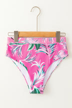 Pink bikini bottoms with tropical leaf print, perfect for summer beach days