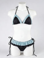 LuckeLadybug LLC bikini with high waist in black and aqua polka dot pattern, featuring adjustable ties