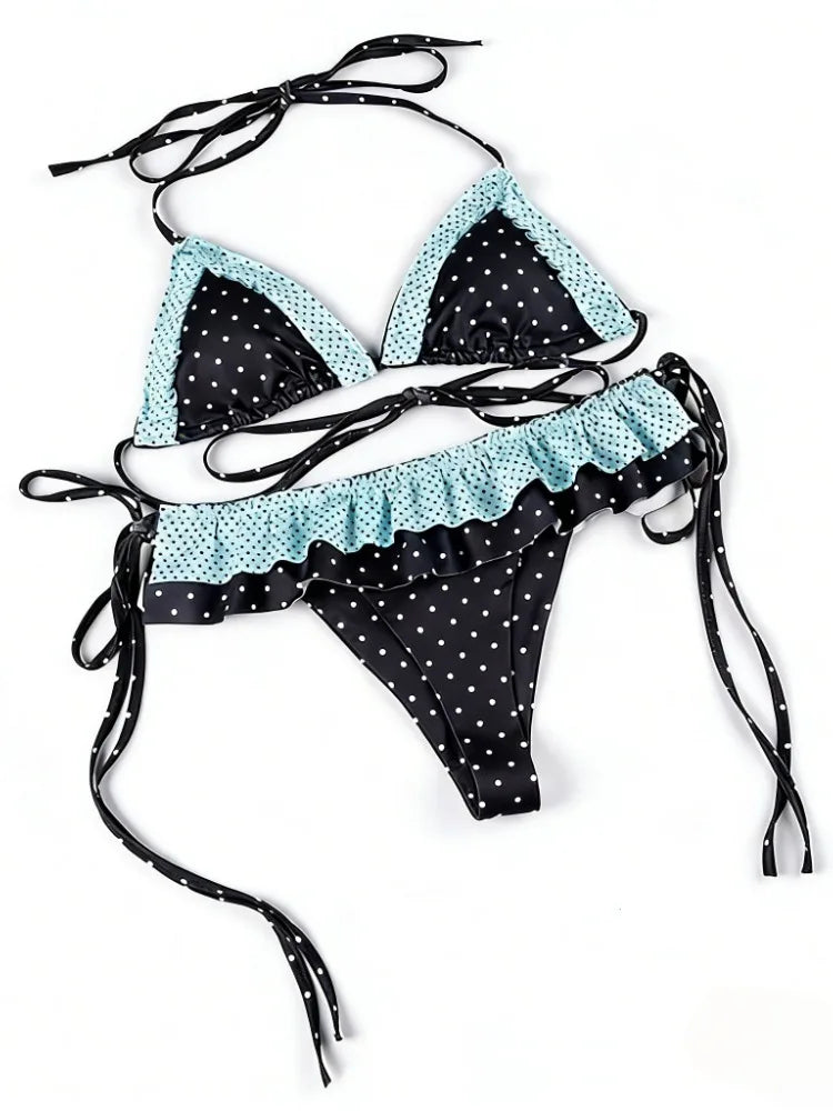 Polka dot bikini with high waist in black and turquoise, featuring ruffled details and adjustable ties
