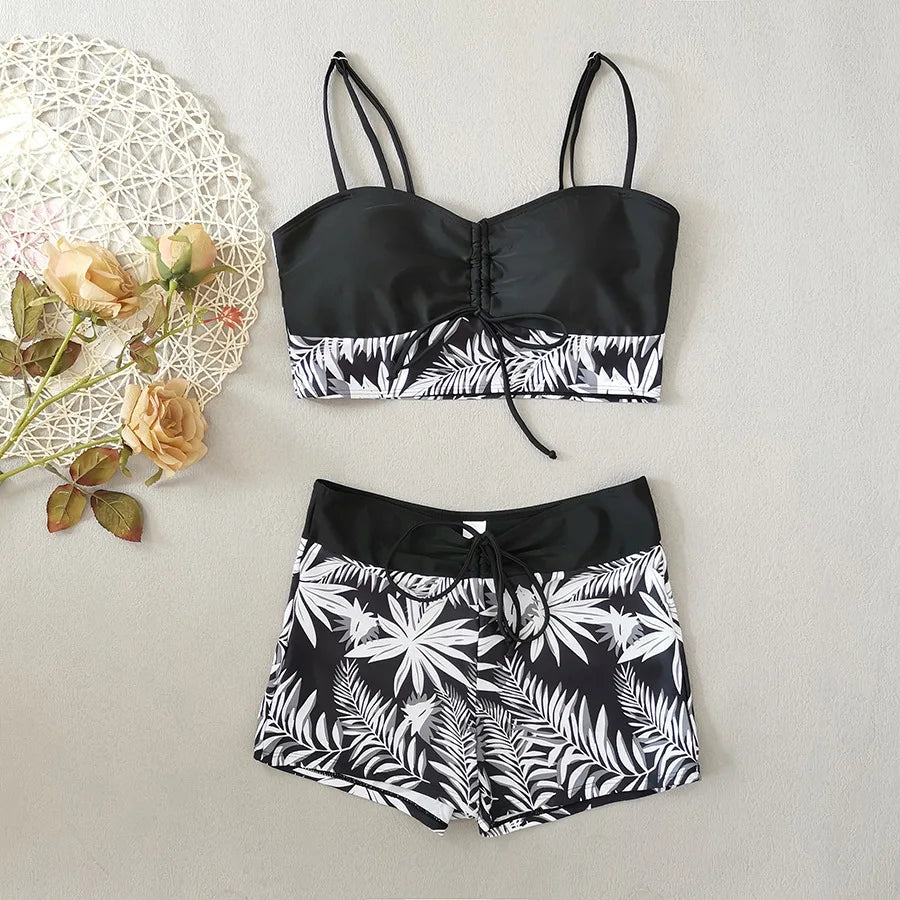 LuckeLadybug LLC bikini with high waist featuring a floral design and adjustable straps