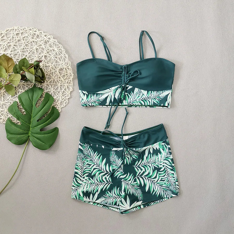LuckeLadybug LLC bikini with high waist featuring a green palm leaf design for stylish summer wear