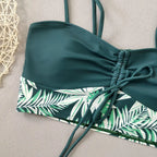 LuckeLadybug LLC bikini with high waist featuring tropical leaf patterns and adjustable straps