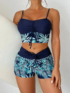 LuckeLadybug LLC bikini with high waist featuring a tropical leaf design and adjustable straps